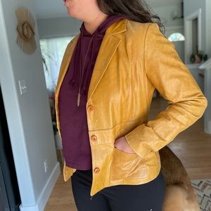 Wilson’s leather jacket. Soft camel colored leather. Size medium.
